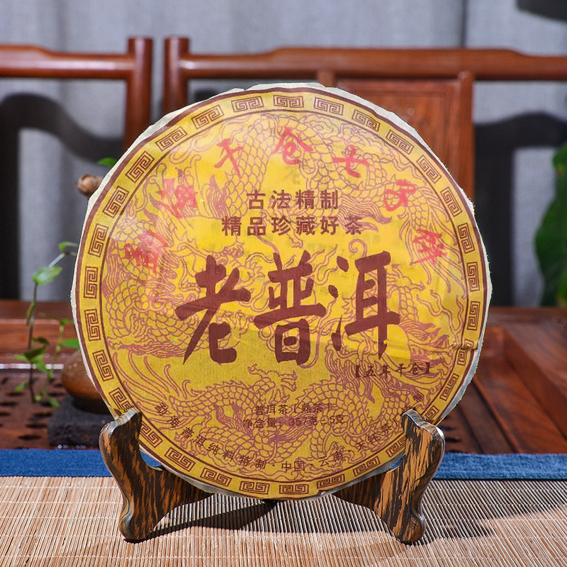โรงงานขายตรงขายส่งยูนนาน Pu'er ชาเค้ก Menghai Pu'er ชาชาสุก 357g Qizi เค้กเก่า Pu'er