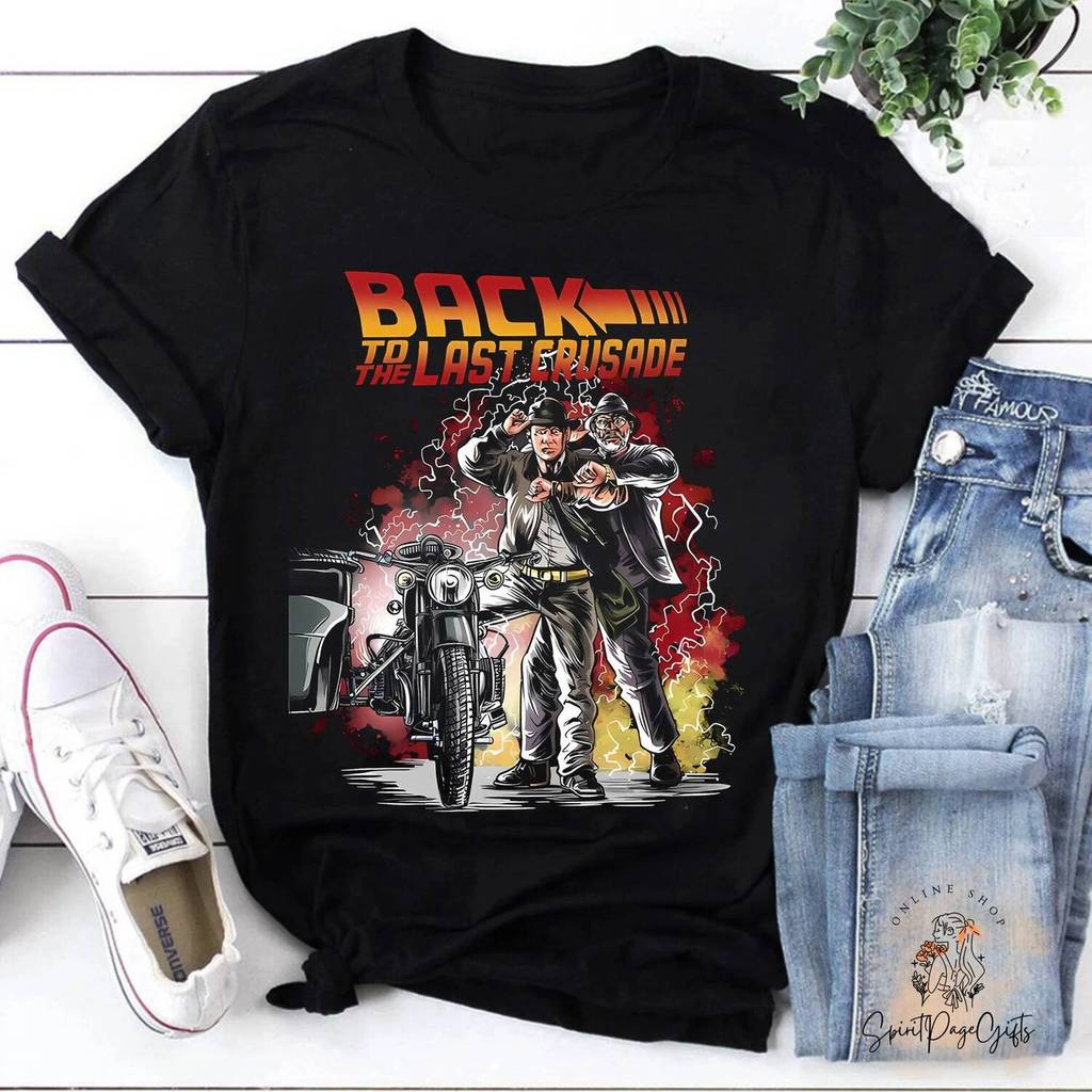 Return To Holy War เสื้อยืด Indiana Jones เสื้อ Indiana Jones เสื้อยืดพิมพ์ลายสนุก