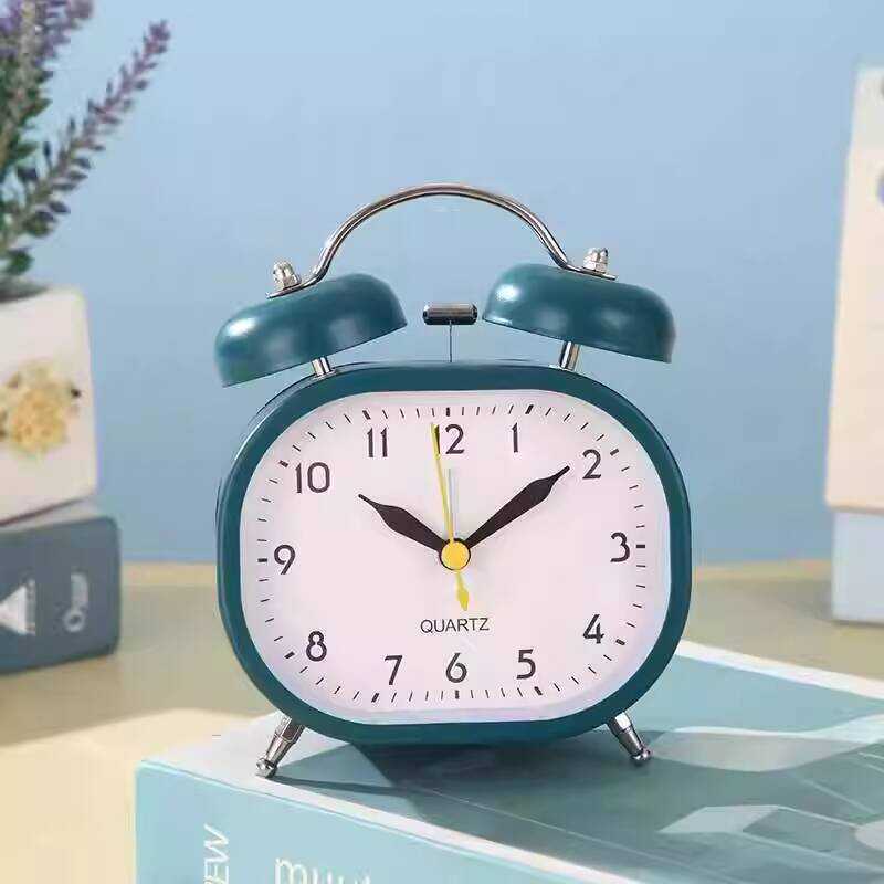 Creative แฟชั่นโลหะ Ringtone นาฬิกาปลุกปิดเสียงนาฬิกาข้างเตียงเด็กรูปไข่ Big Ringtone นาฬิกา