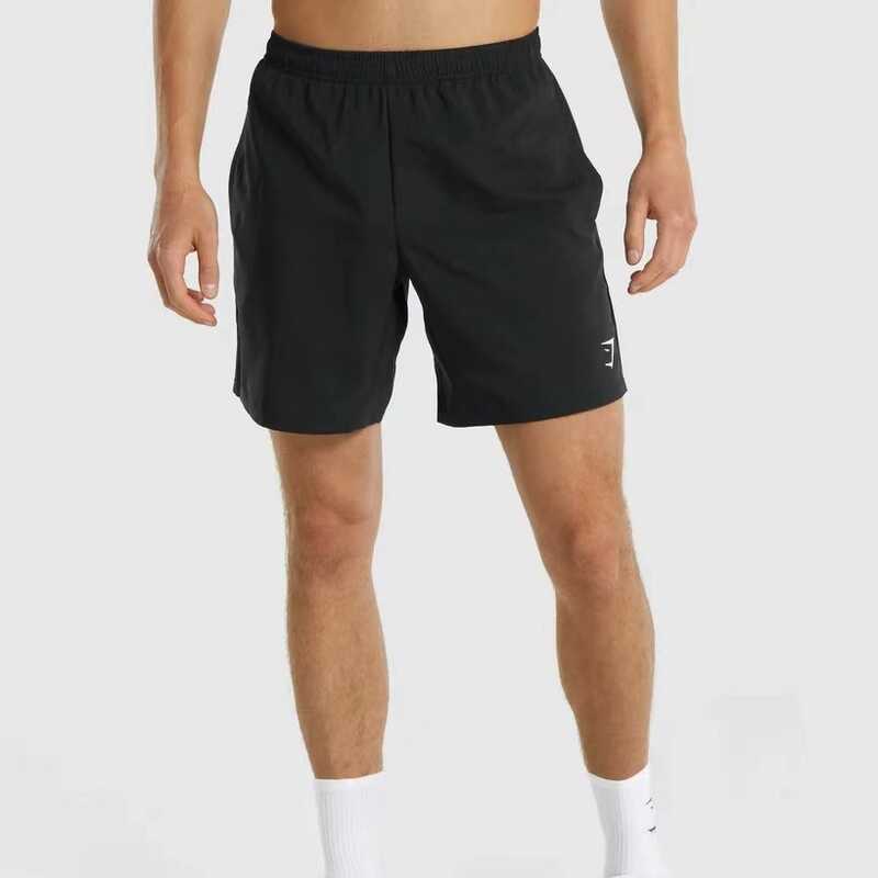 กางเกงขาสั้นฟิตเนส Gymshark สำหรับผู้ชาย แห้งไว เบา และระบายอากาศดี