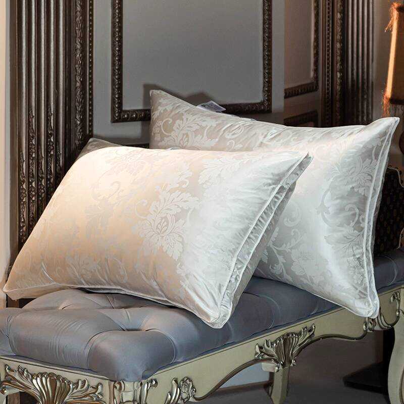 Youxian Home Textiles 95% กํามะหยี่สีขาว หมอนกระดูกสันหลังส่วนคอ เพิ่มความสบายในการนอน หมอนพรีเมียม