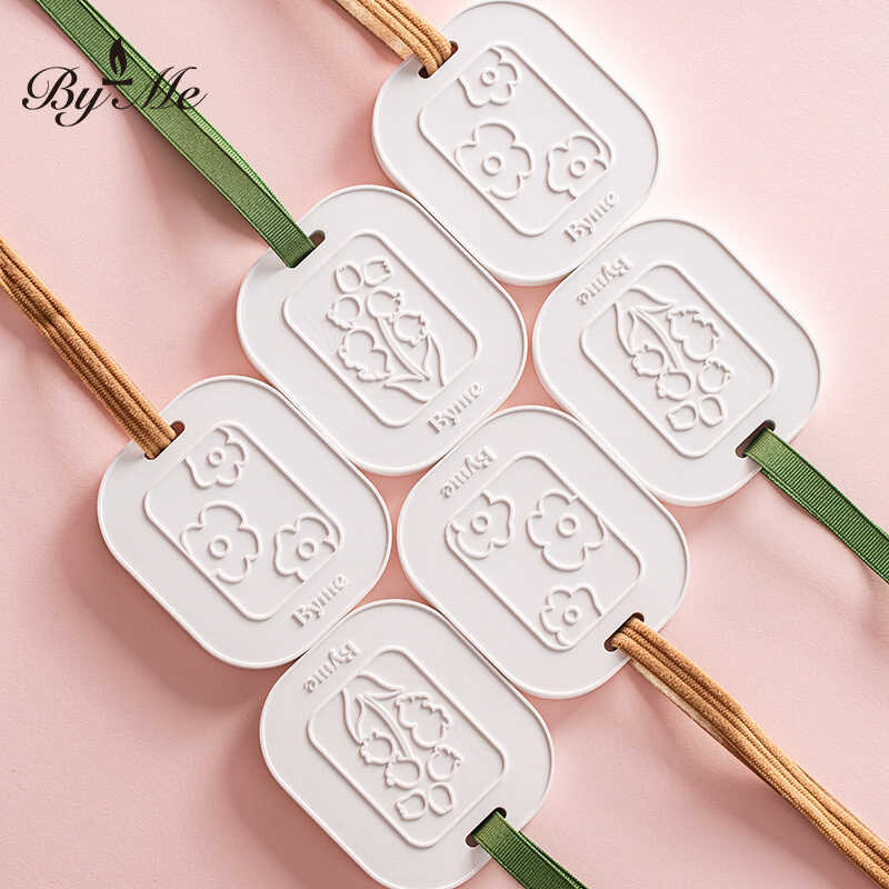 ME ตู้เสื้อผ้าเม็ดขี้ผึ้งอโรมาเธอราพี Lily of the Valley ปูนปลาสเตอร์น้ํามันหอมระเหยเม็ดน้ํามันหอมระ