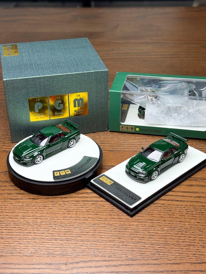 PGM 1: 64 Nissan Nissan GTR R34 Nismo Z-Tune British Green โมเดลรถโลหะผสมเปิดเต็มรูปแบบ