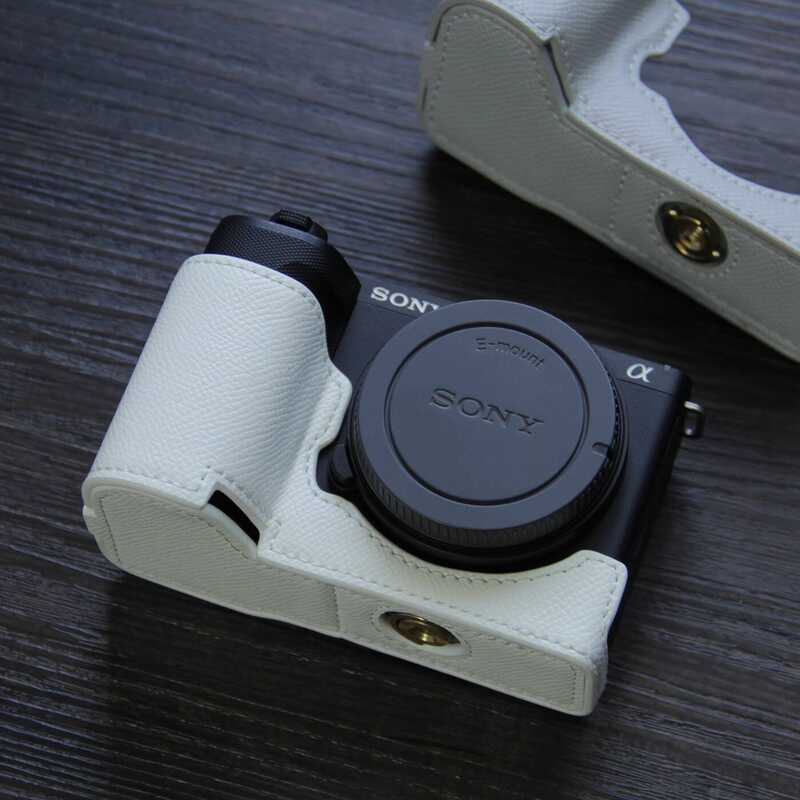 เหมาะสําหรับ Sony ZVE10ii สองกล้อง A67 ฐานหนัง A7C2 เคสหนัง A64a61/zv1m2