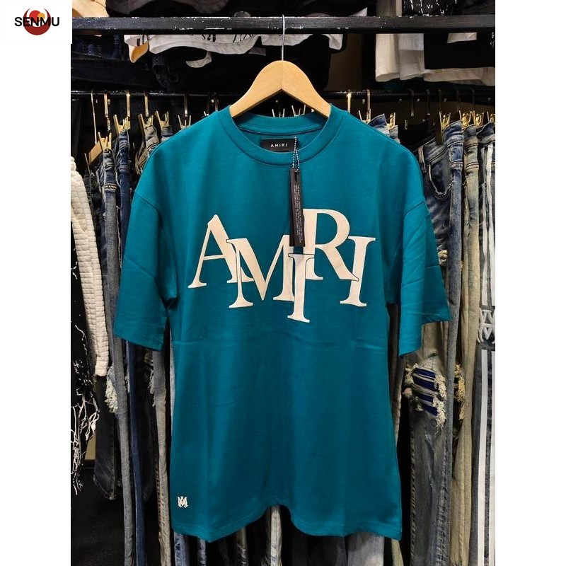 (SM) เสื้อยืดแขนสั้น Amiri – AM โลโก้ซ้อน **เขียวมิ้นหรือฟ้าทะเล สกรีนนูน 3-D ป้ายหนังที่คอครบๆ ป้ายห้อยป้ายแท็กครบๆสวย ด้านในมีป้ายแจ้งขนาดไซส์
