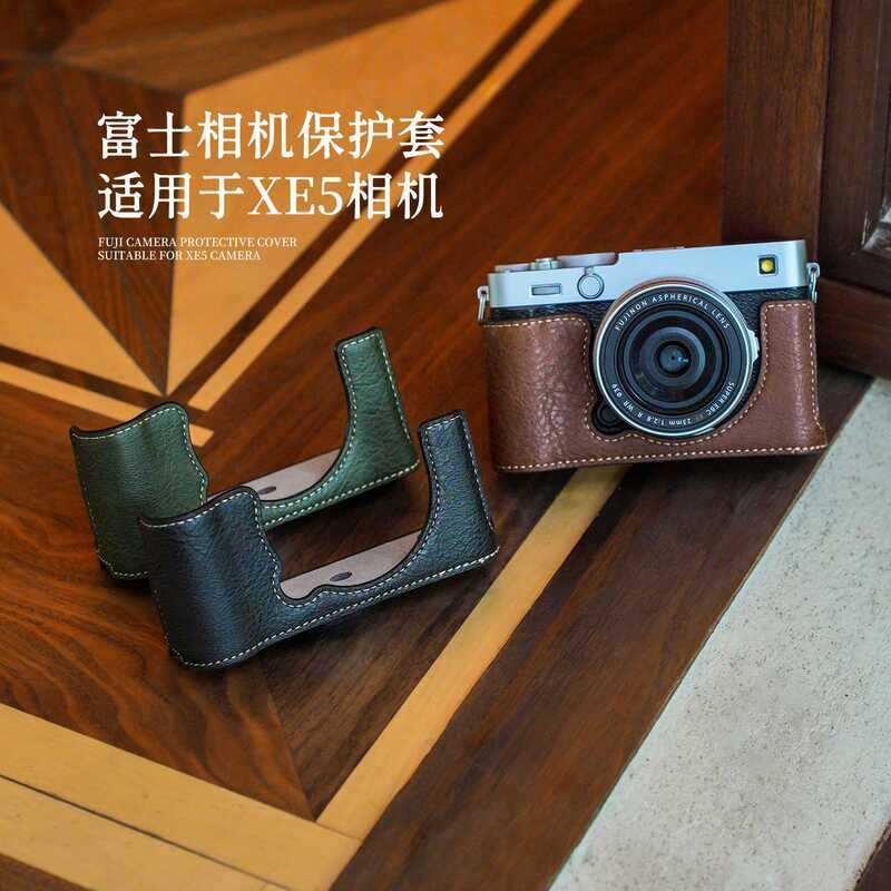 เคสป้องกัน เหมาะสําหรับเคสป้องกันกล้อง Fuji xe5 กระเป๋ากล้อง xe5 ครึ่งแพ็คฐานซองหนังอุปกรณ์เสริม xin
