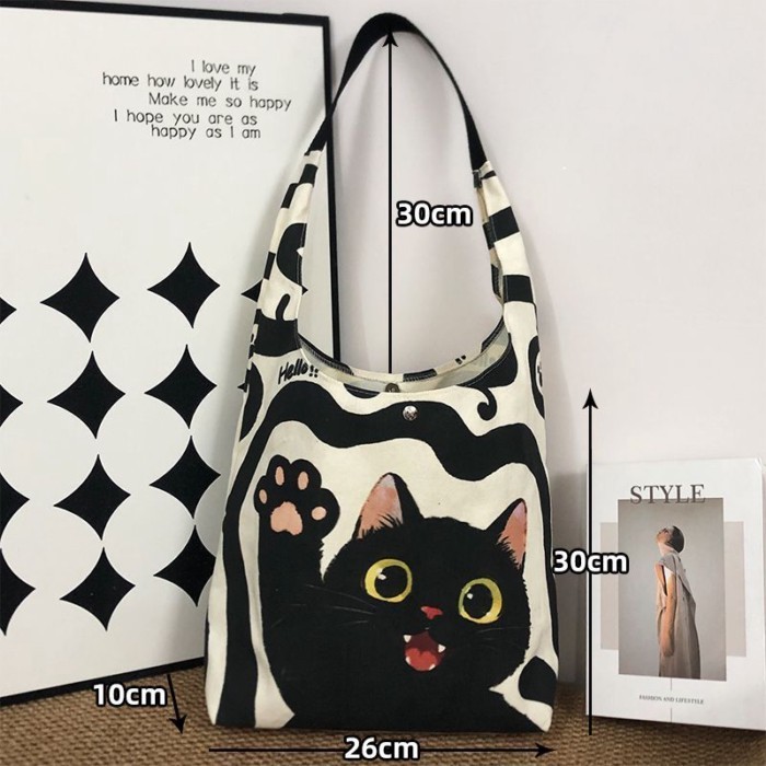 🐈⬛ กระเป๋าสะพายข้างลายแมวดำนำโชค รุ่นใหม่ จุของจุใจ กระเป๋าสตรีสไตล์นักเรียน ใช้ไปทำงาน ทนทาน ดูชิลๆ ผ้าใบเก๋ 👜