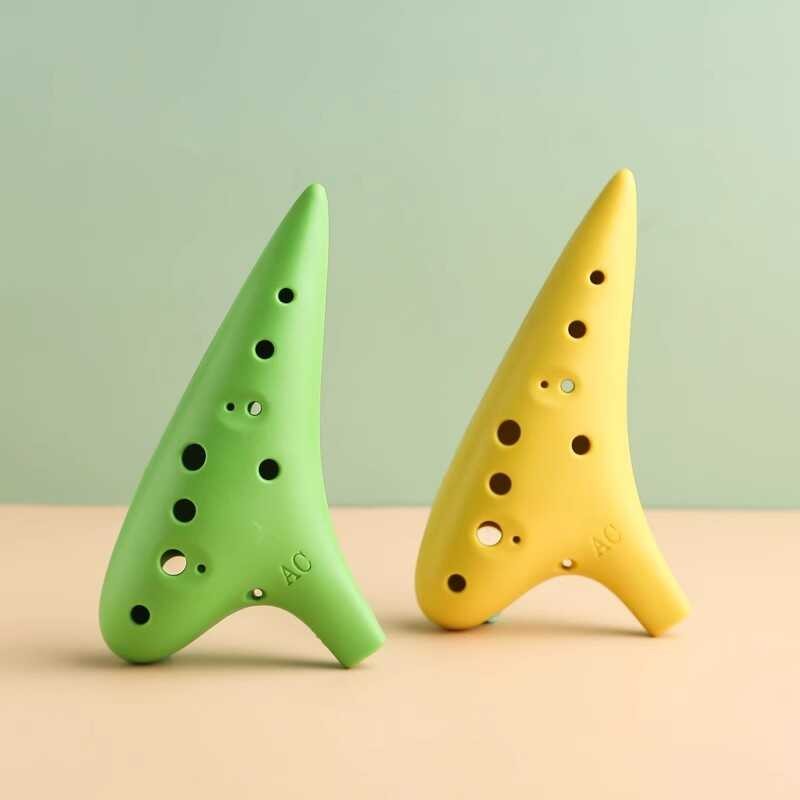 เรซิ่น Ocarina 12 หลุมพลาสติก Alto AC การปรับแต่งสิบสองหลุมเริ่มต้นเบื้องต้นเครื่องดนตรีนักเรียนชั้น
