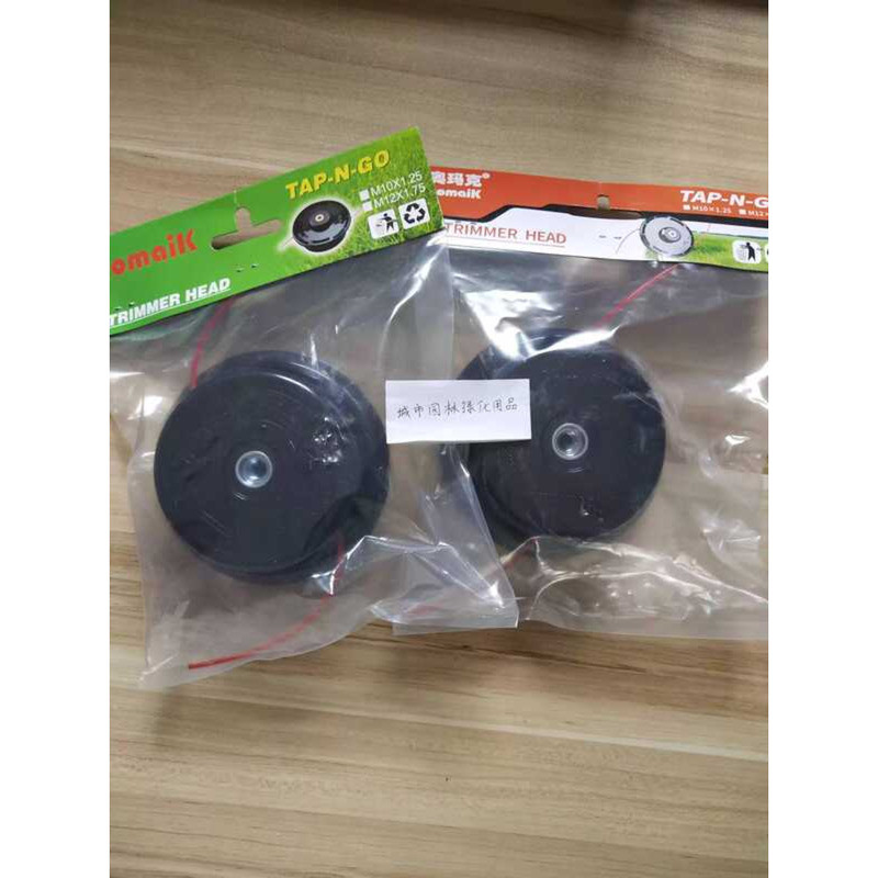 เครื่องเติม Omark หัวเครื่องตัดหญ้า M12 Fushihua M10 Komatsu หัวเครื่องตัดหญ้าทํางานมีรูพรุนหัวเครื่