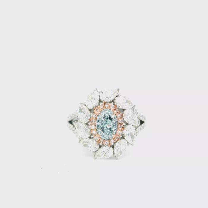 0.65 Carat Light Blue SI1 Clarity Diamond Ring