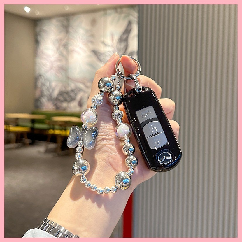 【2025】 เหมาะสำหรับ Mazda Angsaila คีย์ฝาครอบ cx50cx30 atez cx4cx5 buckle buckle cx8 กระเป๋าผู้หญิงใ