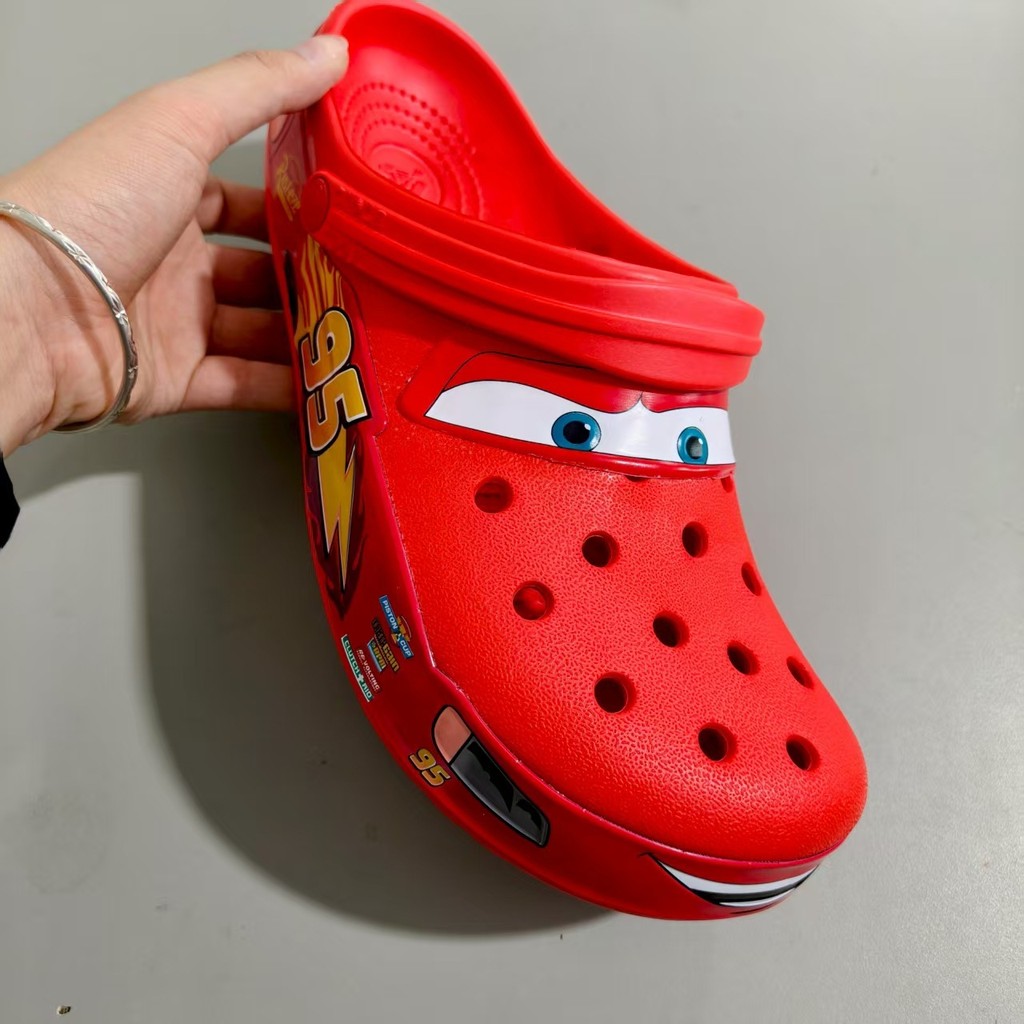 McQueen Hole รองเท้า 95 รถหลุมรองเท้าผู้ชายผู้หญิงรองเท้าแตะรองเท้าแตะรองเท้าชายหาดกันลื่น ad00