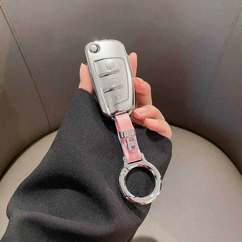 Audi q3 ฝาครอบกุญแจ q2l พับ a3 แบบเก่า s1 รถ a6l ชาย a3l หญิง q7l เปลือก a8 กระเป๋า a7 หัวเข็มขัด q4