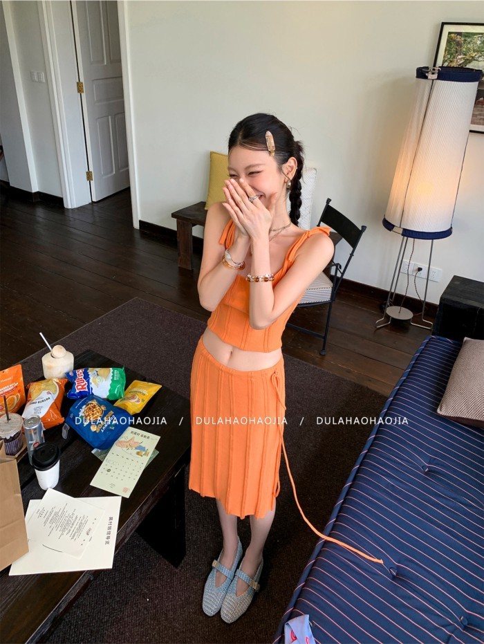 Shanmieleng ฤดูร้อนสไตล์ใหม่สีส้ม Lace-Up สั้นถักสลิงผู้หญิง + Pit Strip ชุดกระโปรง