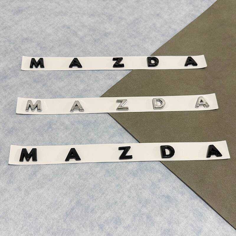 เหมาะสําหรับ MAZDA EZ-6 ดัดแปลงโลโก้รถสีดําตัวอักษรภาษาอังกฤษรถสติกเกอร์ด้านหลัง Tailgate MAZDA เปลี