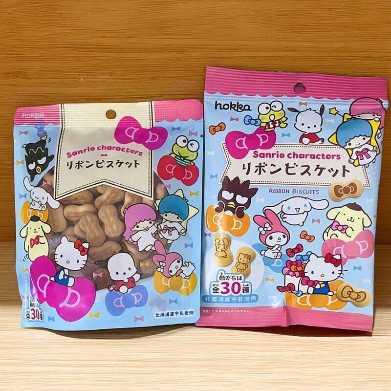 ขนมเด็กนําเข้าจากญี่ปุ่น Hokka Hokka Confectionery Hello Kitty Milk Flavour Biscuit Bow Shape 50g