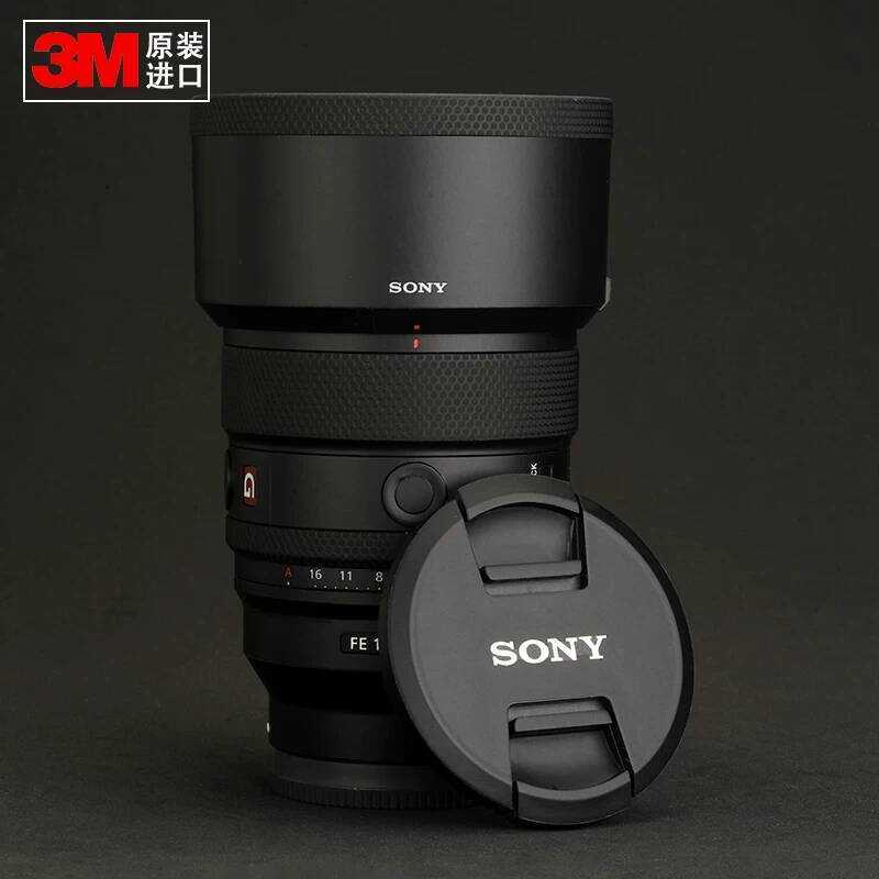 เหมาะสําหรับ SONY 85/1.4GM รุ่นที่สอง 85GM II รุ่นสติกเกอร์เลนส์สติกเกอร์ป้องกันวัสดุนําเข้า
