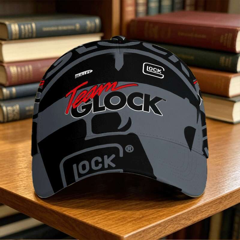 หมวก Team Glock Perfection 25th Anniversary - รูปแบบเรขาคณิตสีเทาเข้มพร้อมโลโก้ "GLOCK PERFECTION" ป