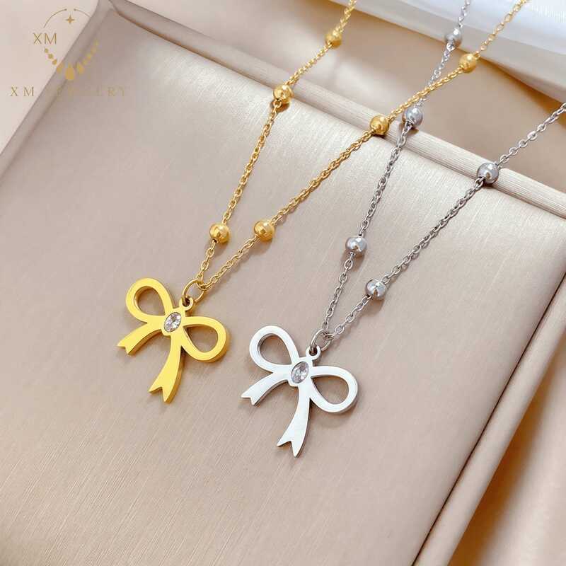 XM JEWELRY สร้อยคอเหล็กไททาเนียม ดีไซน์เรียบง่ายและหลากหลาย ดีไซน์โบว์ สำหรับสุภาพสตรี ไม่จางหาย สาม