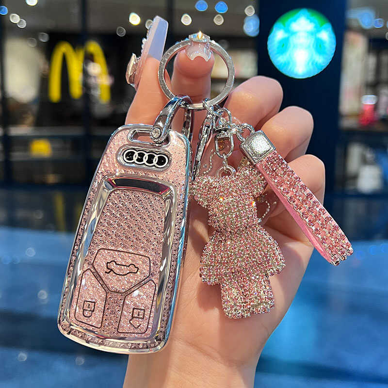 เหมาะสําหรับ 2024 Audi a6l ฝาครอบกุญแจ a4l รถ q5l เปลือก a3a5a8 แพ็ค q7q4ron หัวเข็มขัด tt หญิง rs