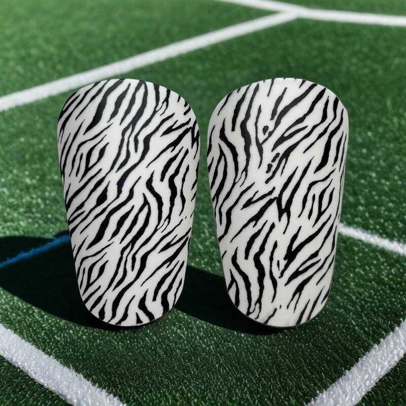 Kellett EVA Hightlight พลาสติก Breathable ทนทานคุ้มค่า Shin Grds สําหรับป้องกันฟุตบอล