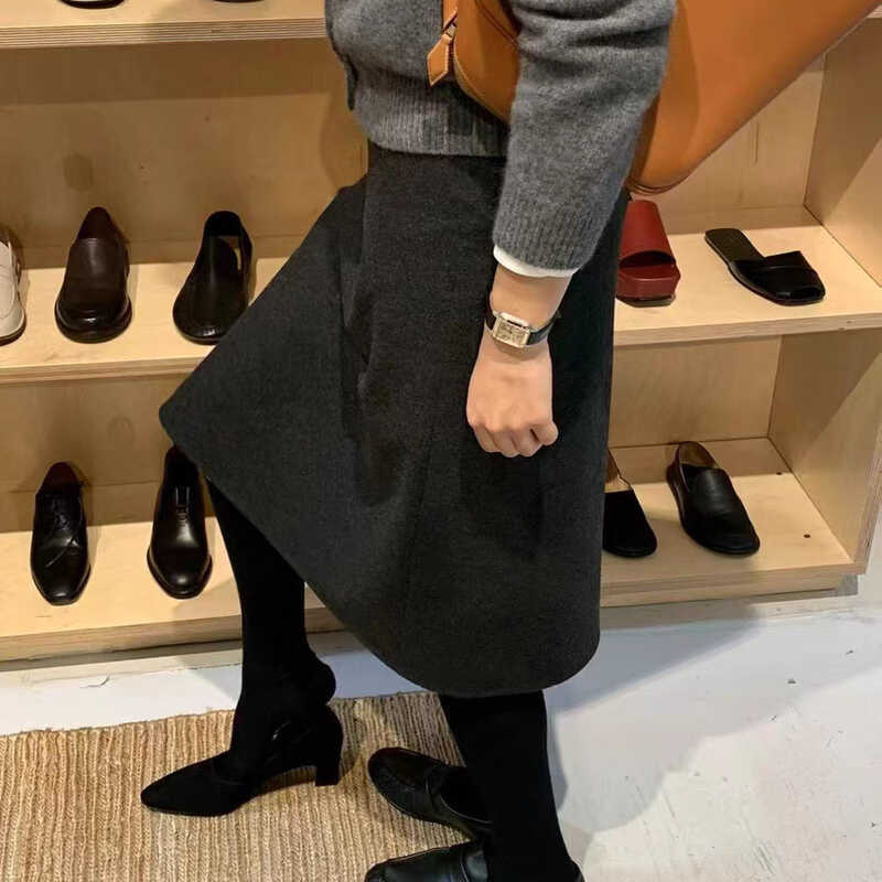 2025 ฤดูหนาวเกาหลี Dongdaemun OU * CE Classy สีทึบเอวสูง Slimmer ดูกระโปรงยาวปานกลาง
