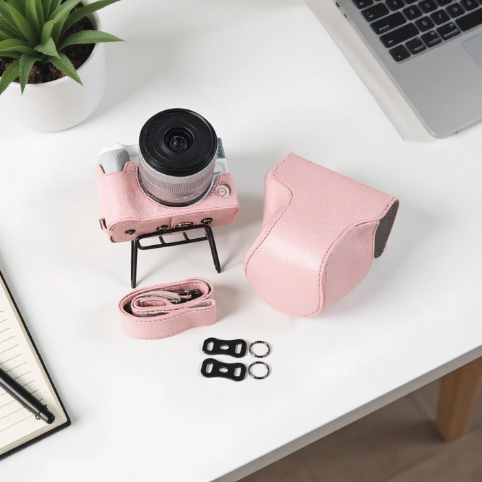 Canon R50V เคสป้องกันกล้อง r50v กระเป๋ากล้อง R50v Micro Single รวมทุกอย่างซองหนังฐานอุปกรณ์เสริมกระเ