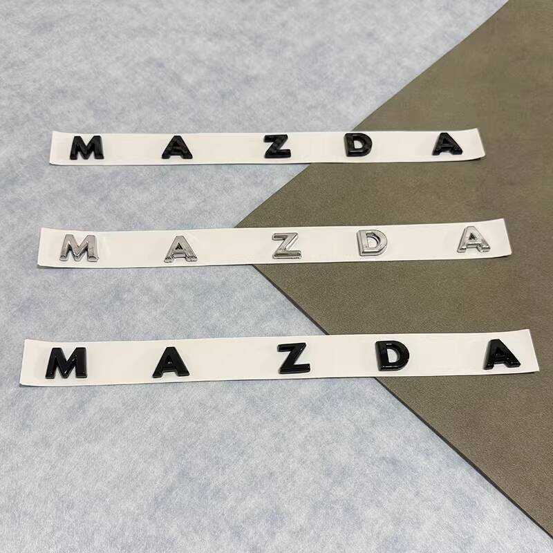 เหมาะสําหรับ MAZDA EZ-6 ดัดแปลงโลโก้รถสีดําตัวอักษรภาษาอังกฤษรถสติกเกอร์ด้านหลัง Tailgate MAZDA เปลี