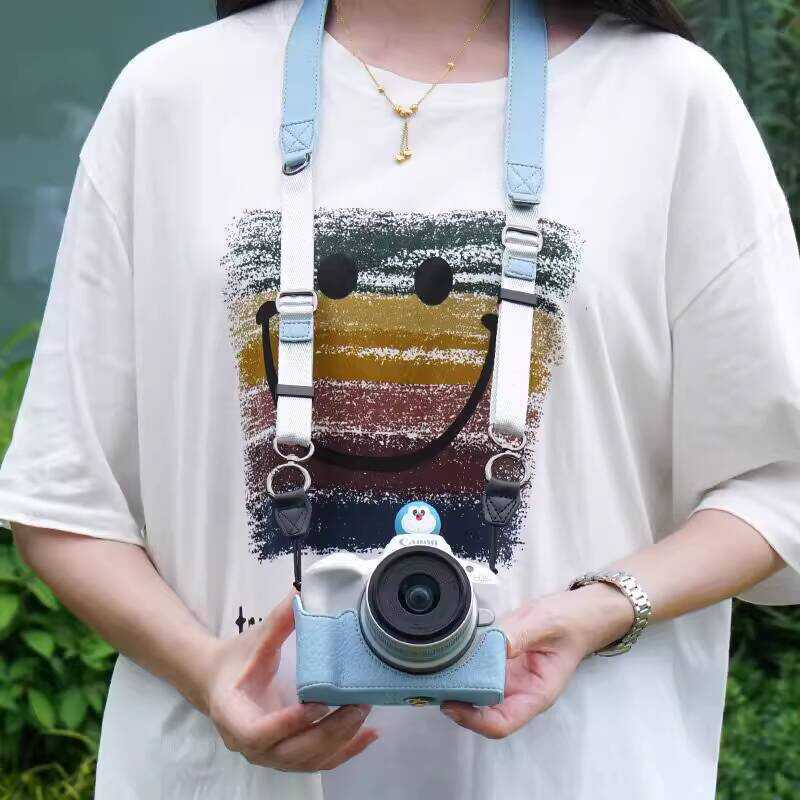 เหมาะสําหรับ Canon R50/R1 Littern Base 2D2 กระเป๋าเก็บซองหนัง M50 เคสป้องกัน R10 กระเป๋ากล้องแป้ง