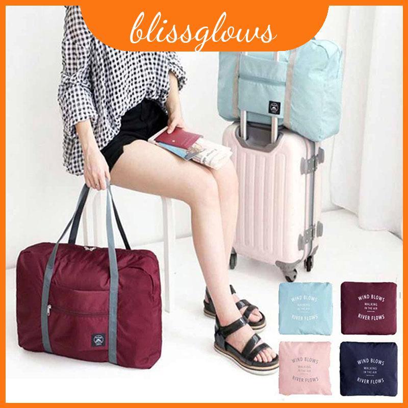 กระเป๋าเดินทางแบบพกพา Chic แบบพับได้ Carry-on Duffle Bag สําหรับผู้หญิงยุคใหม่ The On Go