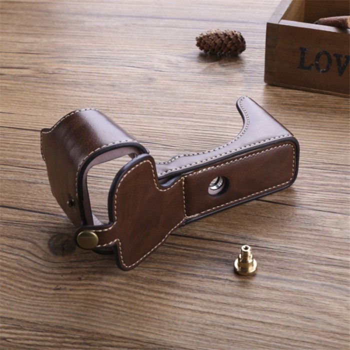 เหมาะสําหรับ Sony ZVE10/A7CZV1m2F เคสหนัง A7C2 R/R5 กระเป๋ากล้อง A7m4m3/r4 ฐาน A6400