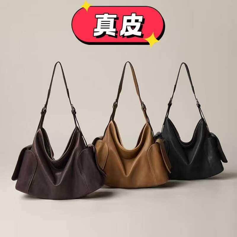 กระเป๋าสะพายเอี้ยม Cowhide แบรนด์ Qiuzhen ขนาดใหญ่ ทนทาน ใช้สะดวกสำหรับเดินทางและการทำงานทุกวัน