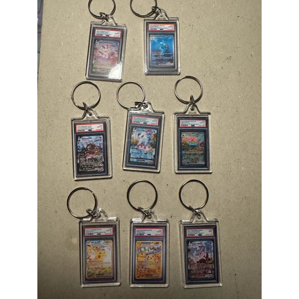 Pokemon KEYCHAIN ของที่ระลึก blastoise, rayquaza, pikachu, glaceon, slyveon,venusaur ไม่ใช่ psa 10 c