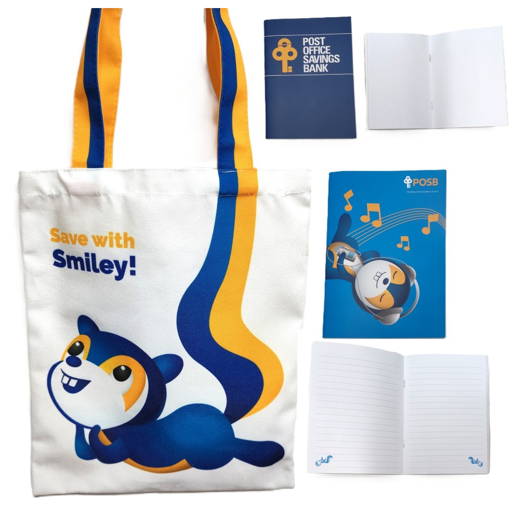 Dbs POSB bank smiley 32.5 x 39cm tote bag / 15 x 21cm light blue notebook with lines / 10.5 x 14.5cm