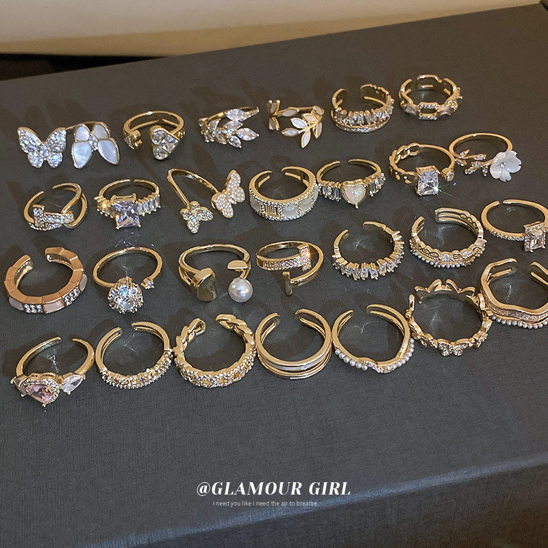 DREW ทองแท้เคลือบด้วยไฟฟ้าเพทายเพชรชุดแหวนหลายเปิดแสงหรูหราซอกแฟชั่นแหวนนิ้วชี้