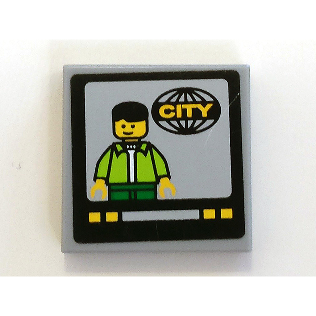 Brick2cube Part - Tile 2 x 2 with TV Screen with Man and 'CITY' Pattern (Sticker) - Set 7639 - 3068p