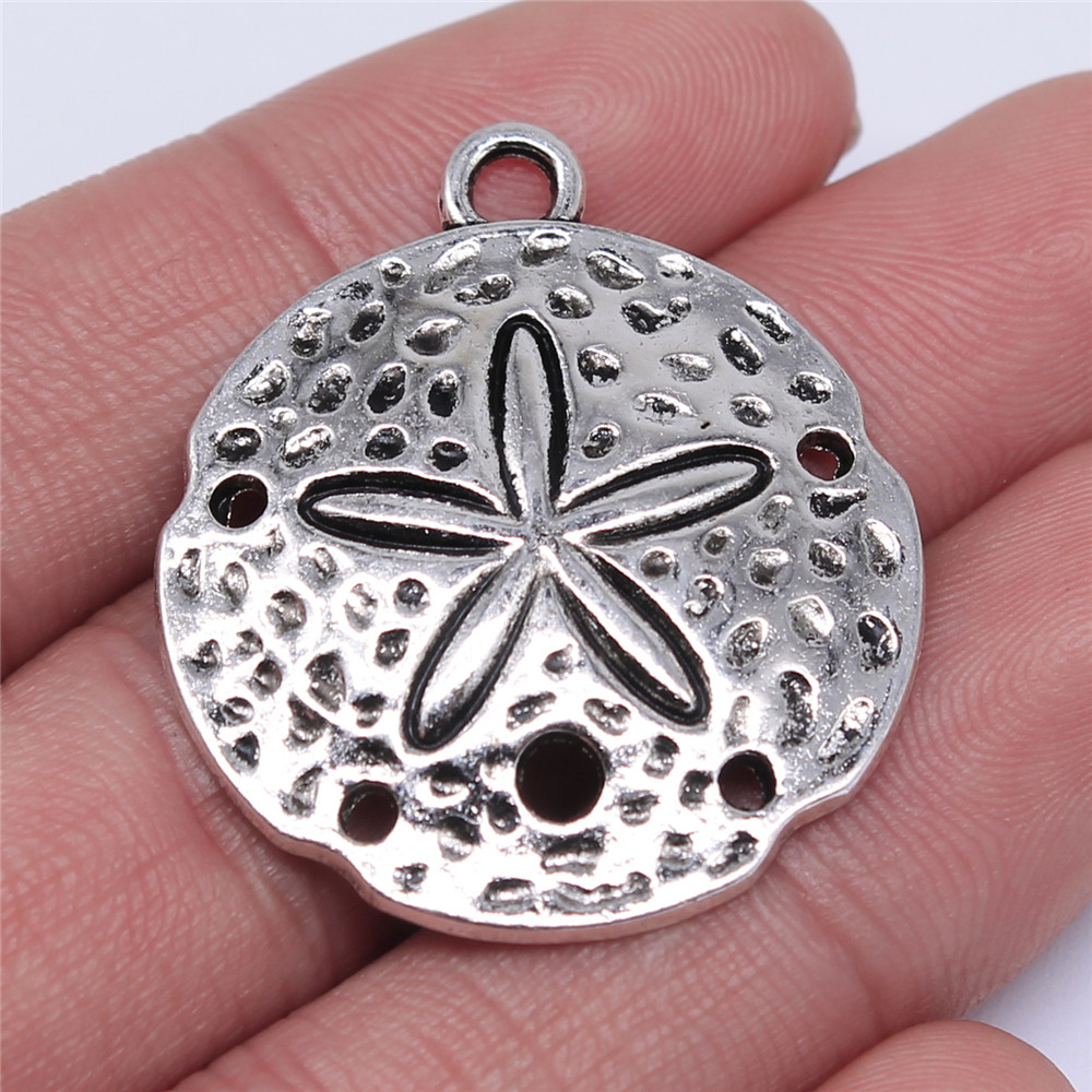 WYSIWYG 3pcs 35x30 มม.ทราย Dollar Charm จี้สําหรับเครื่องประดับทําโบราณเงินสีทราย Dollar จี้ Charm