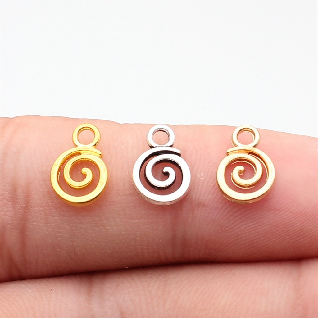 WYSIWYG 40 ชิ้น 11x8 มิลลิเมตร Swirl Charm จี้สําหรับเครื่องประดับทํา 3 สี Swirl จี้ Charm Swirl
