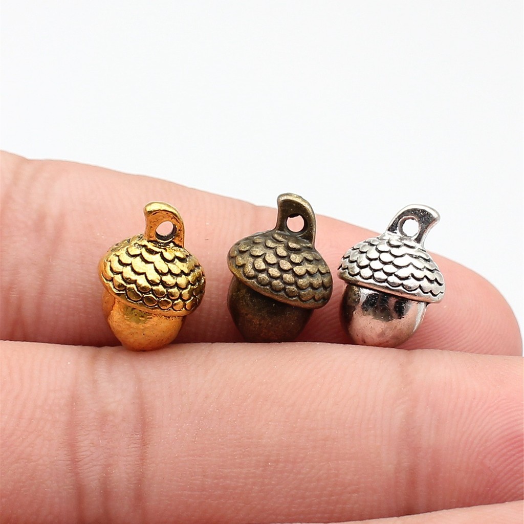 WYSIWYG 10pcs 15x10x9 มม.จี้ 3D Acorns 3D Acorns Charm จี้สําหรับเครื่องประดับทําโบราณเงินสี 3D Acor