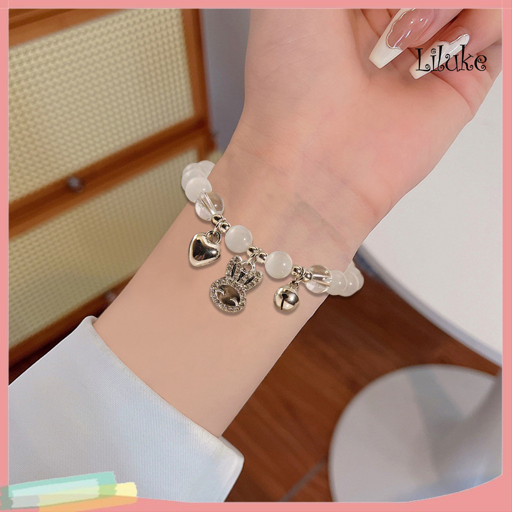 [LK] 2 ชิ้นสร้อยข้อมือผู้หญิง Faux โอปอล Bell Clover จี้หัวใจ Rhinestone ตกแต่งมูนสโตนกําไลข้อมือปรั