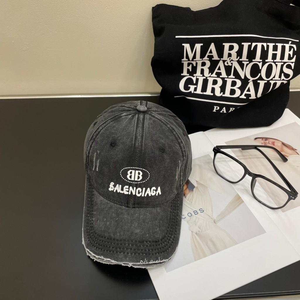 LV555 สีดําสีขาวคลาสสิก LOGO หมวกเบสบอล Unisex