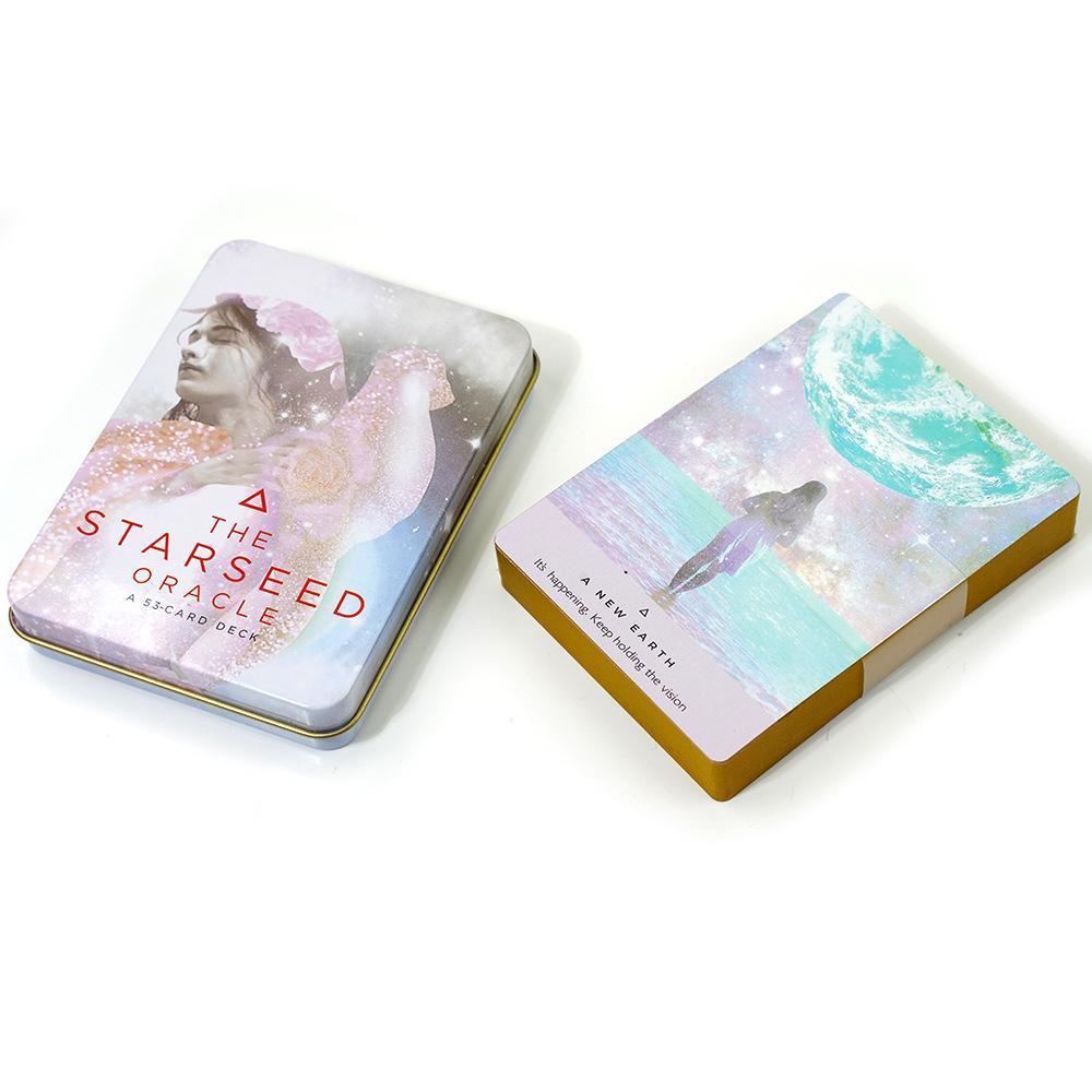 The Starseed Oracle Tarot Deck ในกล่องดีบุกขอบปิดทองสําหรับการ์ดเกมบอกโชค