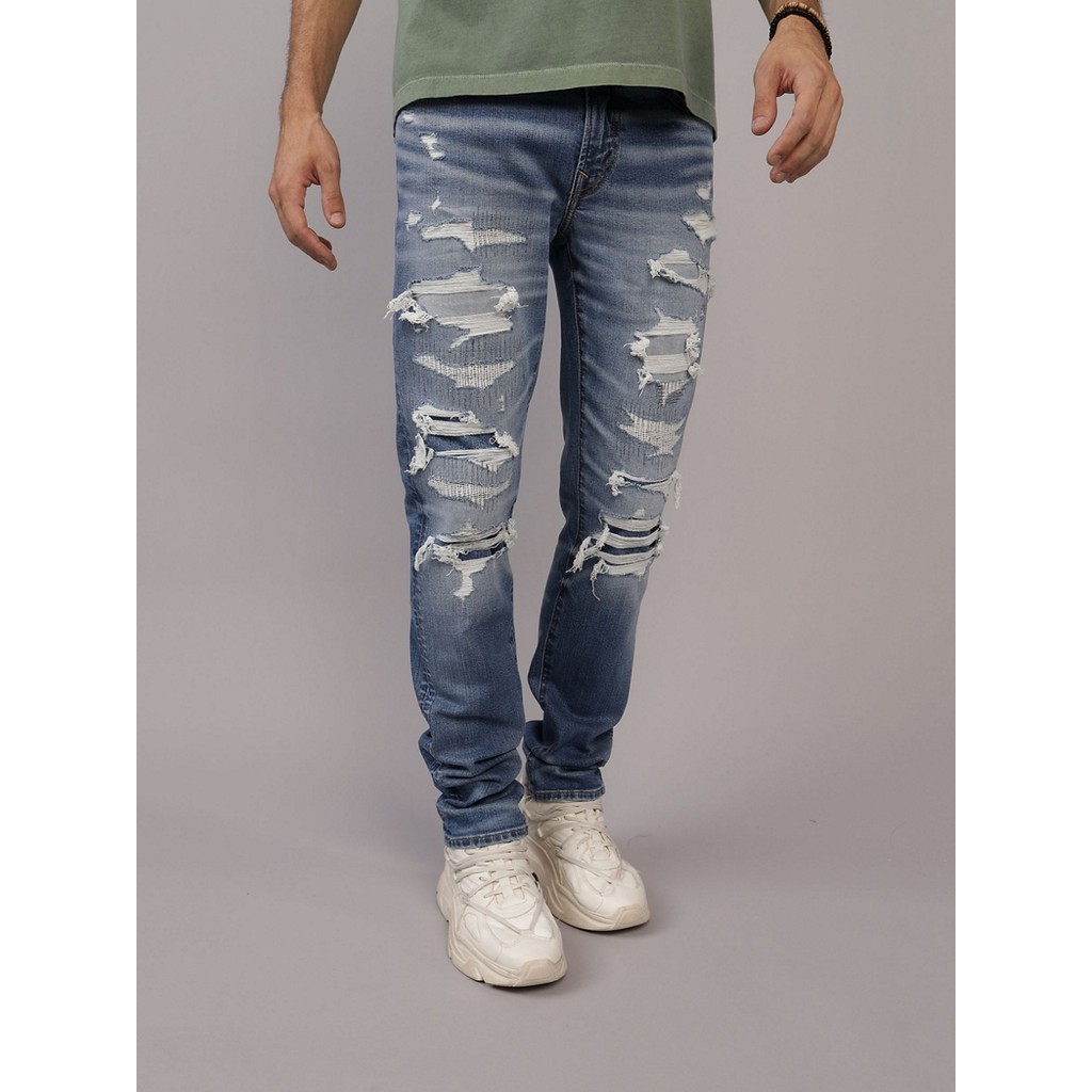 American Eagle กางเกงยีนส์ผู้ชาย INTL EXCLUSIVE MEDIUM W/ DESTROY สี MEDIUM BRIGHT INDIGO - 011-6908-857