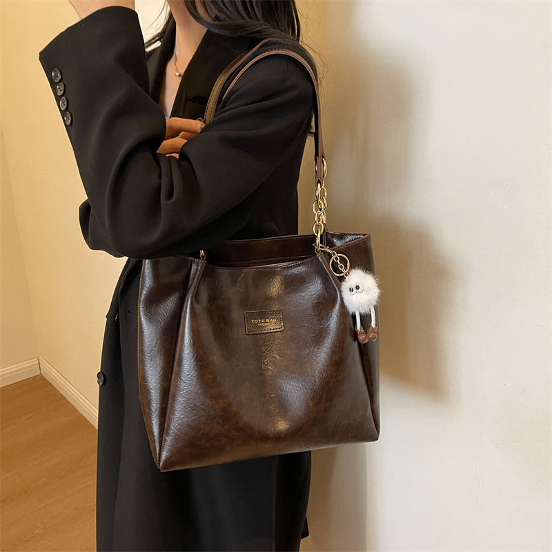 กระเป๋าโท้ทความจุขนาดใหญ่หญิง 2025 กระเป๋า ผู้สื่อสาร สไตล์ใหม่นักศึกษาวิทยาลัยชั้นพร็อพกระเป๋ากระเป๋าสะพาย - รูปที่ 6