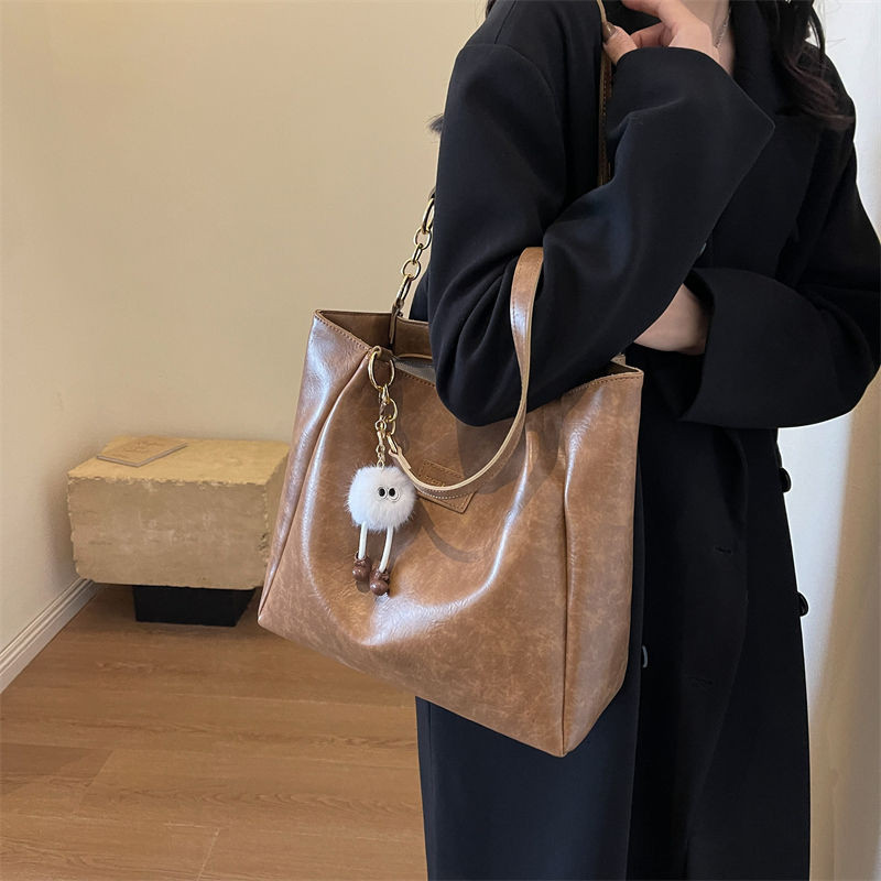 กระเป๋าโท้ทความจุขนาดใหญ่หญิง 2025 กระเป๋า ผู้สื่อสาร สไตล์ใหม่นักศึกษาวิทยาลัยชั้นพร็อพกระเป๋ากระเป๋าสะพาย - รูปที่ 4