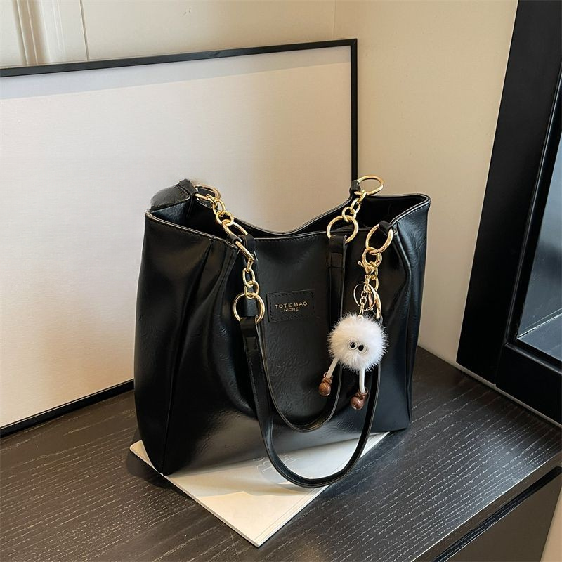 กระเป๋าโท้ทความจุขนาดใหญ่หญิง 2025 กระเป๋า ผู้สื่อสาร สไตล์ใหม่นักศึกษาวิทยาลัยชั้นพร็อพกระเป๋ากระเป๋าสะพาย - รูปที่ 3