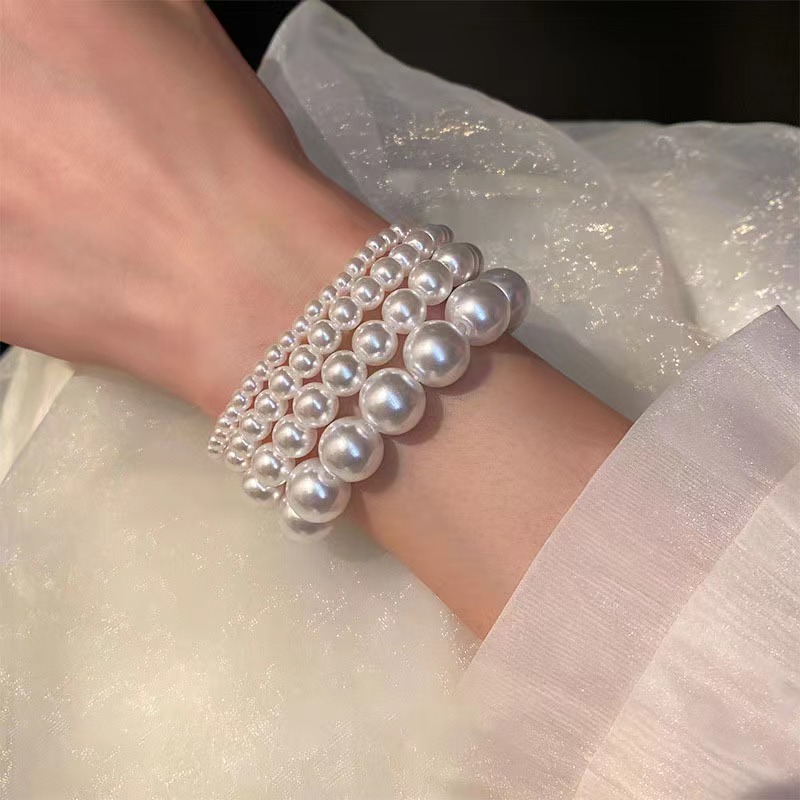 สร้อยข้อมือ ประดับไข่มุก แบบยืดหยุ่น หรูหรา เข้ากับทุกการแต่งกาย สไตล์ฝรั่งเศส แฟชั่นเรโทร สําหรับผู้หญิง