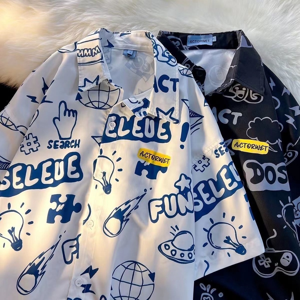 เสื้อเชิ้ตแขนสั้น อเนกประสงค์ พิมพ์ลายดาวเคราะห์ และตัวอักษร UFO ทรงหลวม สไตล์วินเทจ สําหรับผู้ชาย และผู้หญิง