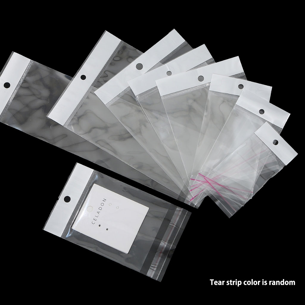 100 ชิ้นโปร่งใสซีลกาวตนเองถุงเก็บพลาสติก OPP Pack กระเป๋าแขวนหลุมถุงบรรจุภัณฑ์ขายปลีกแถบฉีกขาดสีเป็นสุ่ม