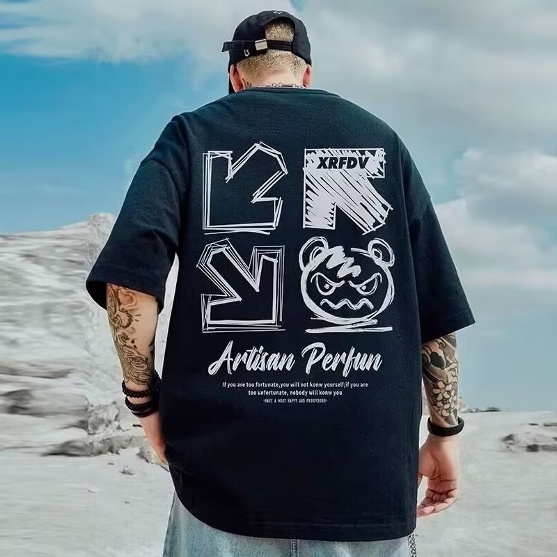 M-5xl ฤดูร้อนผู้ชายสไตล์อเมริกันแขนสั้นเสื้อยืดแฟชั่นปีศาจพิมพ์กราฟิกขนาดใหญ่ Tees Baggy Casual Tops สีดําสีขาว Hiphop Streetwear